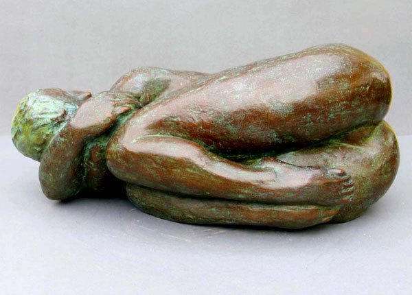 Curled Up - Limited edition bronze sculpture of a nude female - side view of this realistic, figurative sculpture