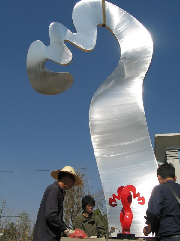 Monumental stainless steel sculpture a public artwork commission executed by Chinese sculptor Zhang Yaxi - another view
