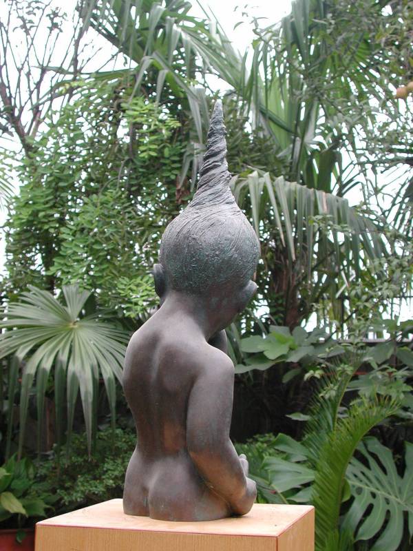 Back view of Chinese Child sculpture