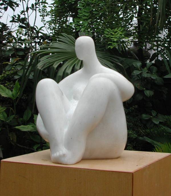 Stylized marble sculpture "Seated" - by contemporary Chinese sculptor Zhang Yaxi