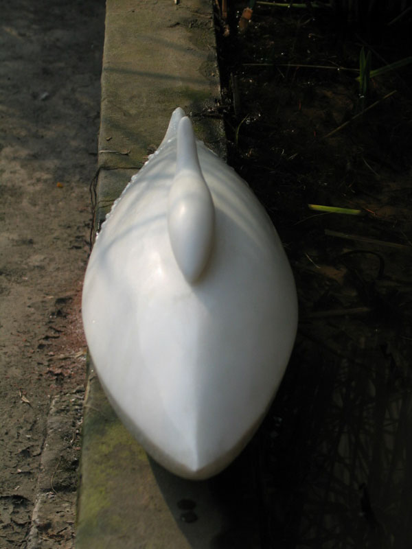 A front view of the same white marble sculpture - an original marble artwork by contemporary Chinese sculptor Zhang Yaxi (Yaxi Zhang)