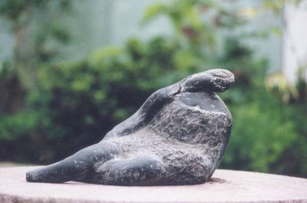 Stone sculpture "Sitting" by contemporary Chinese sculptor Zhang Yaxi - see also the terra cotta version below